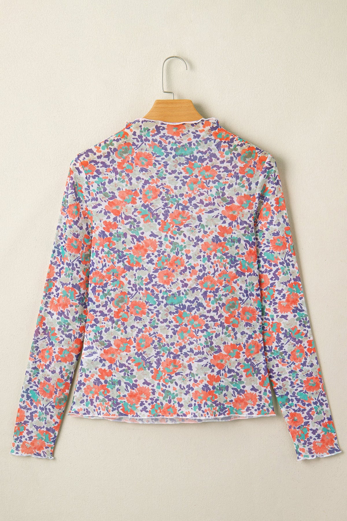 Floral Mesh Mock Neck Top in blue, side view