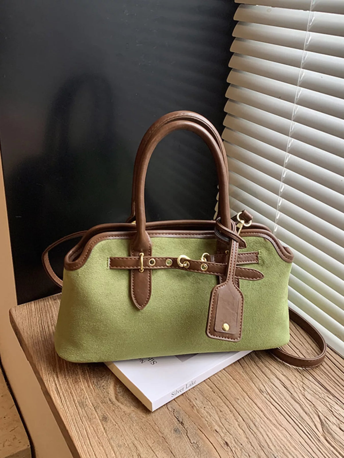 Suede Buckle Detail Handbag in black, coffee brown, green and yellow, close-up detail