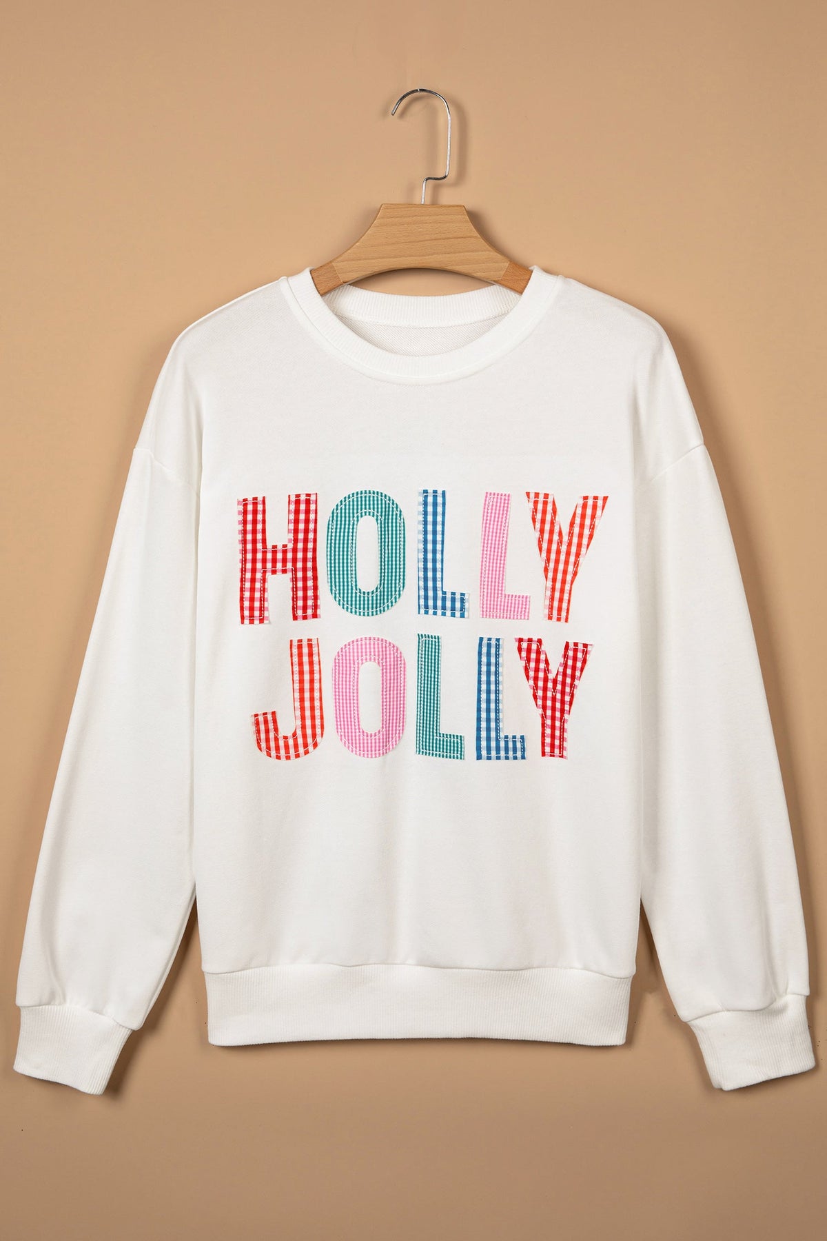 Christmas Holly Jolly Patchwork Sweatshirt in white, detail