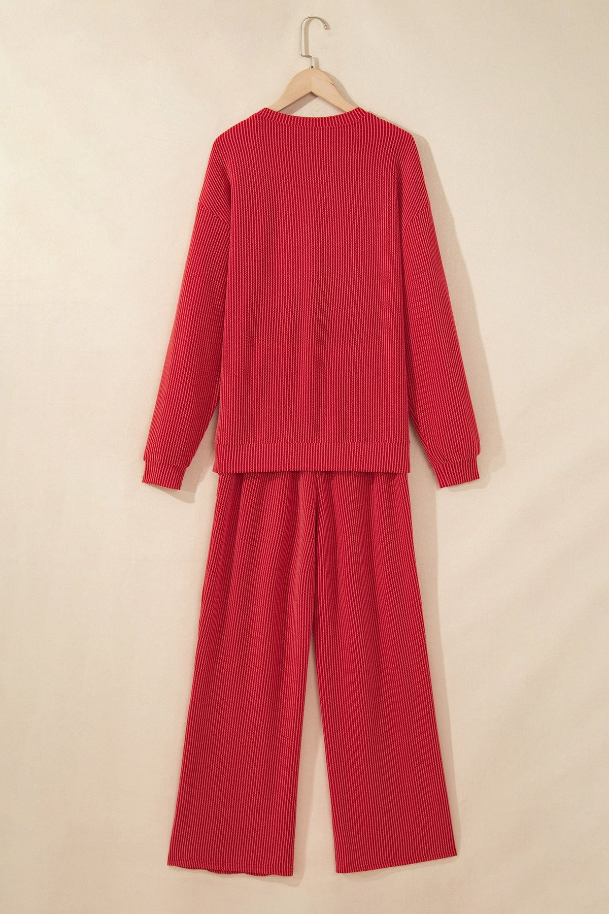 Christmas Corded Knit Top & Pants Set in red, black and green, styled view
