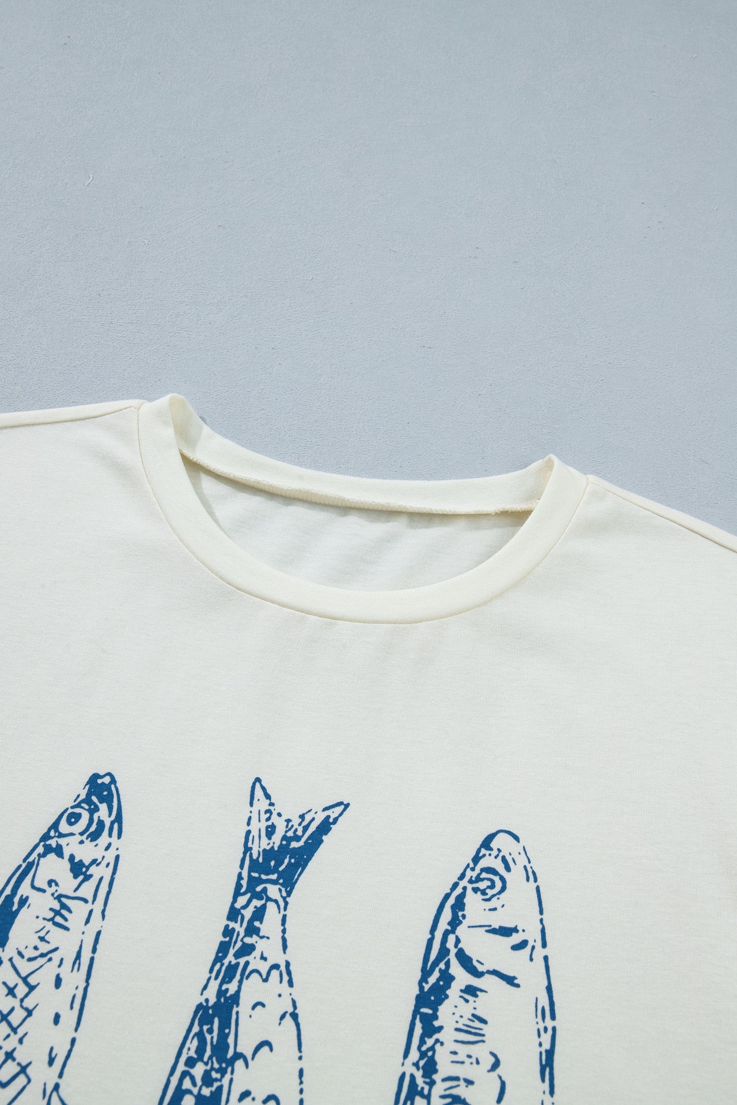 Fish Short Sleeve Round Neck Graphic T-Shirt - styled knotted at waist with denim shorts
