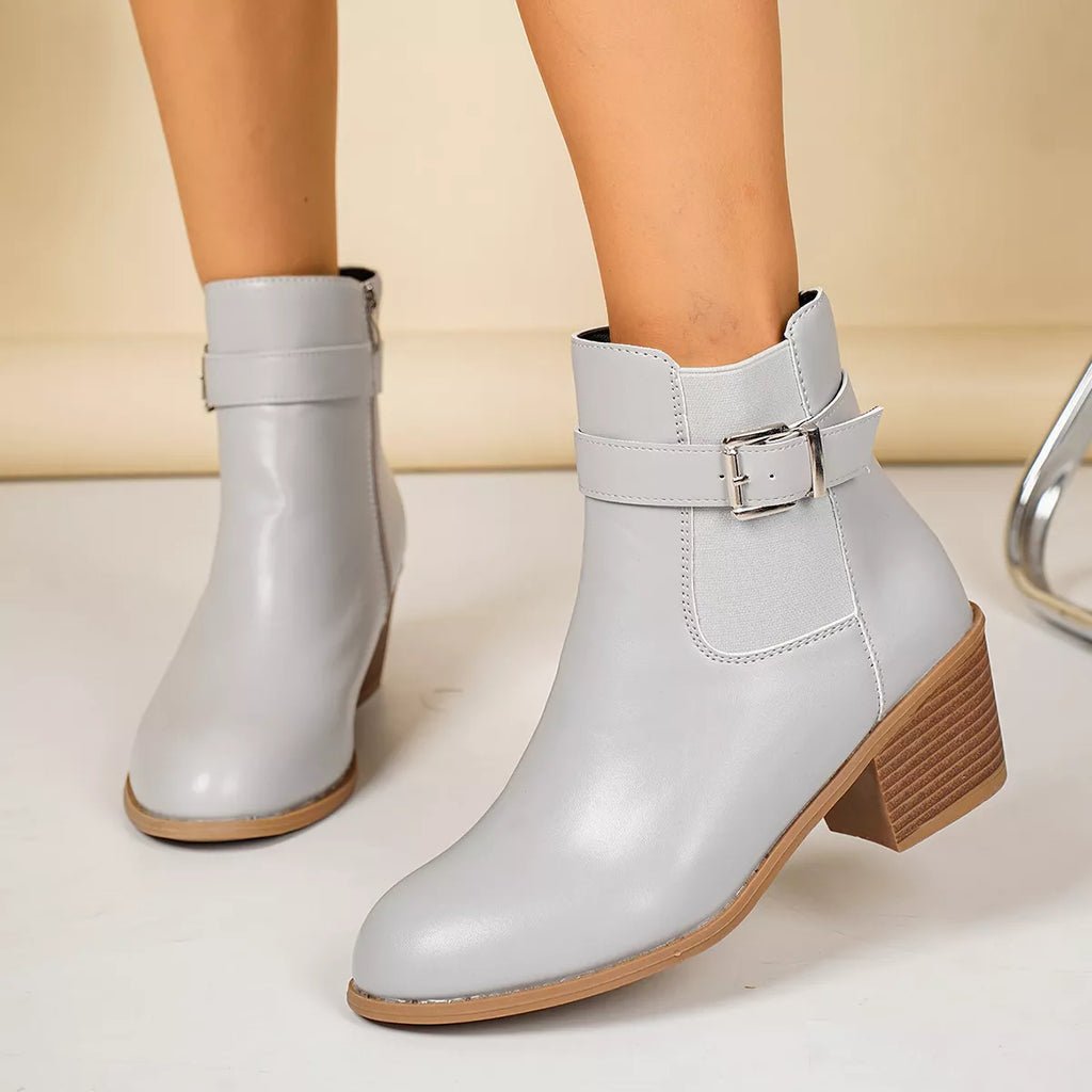 Point toe block heel boots, side view