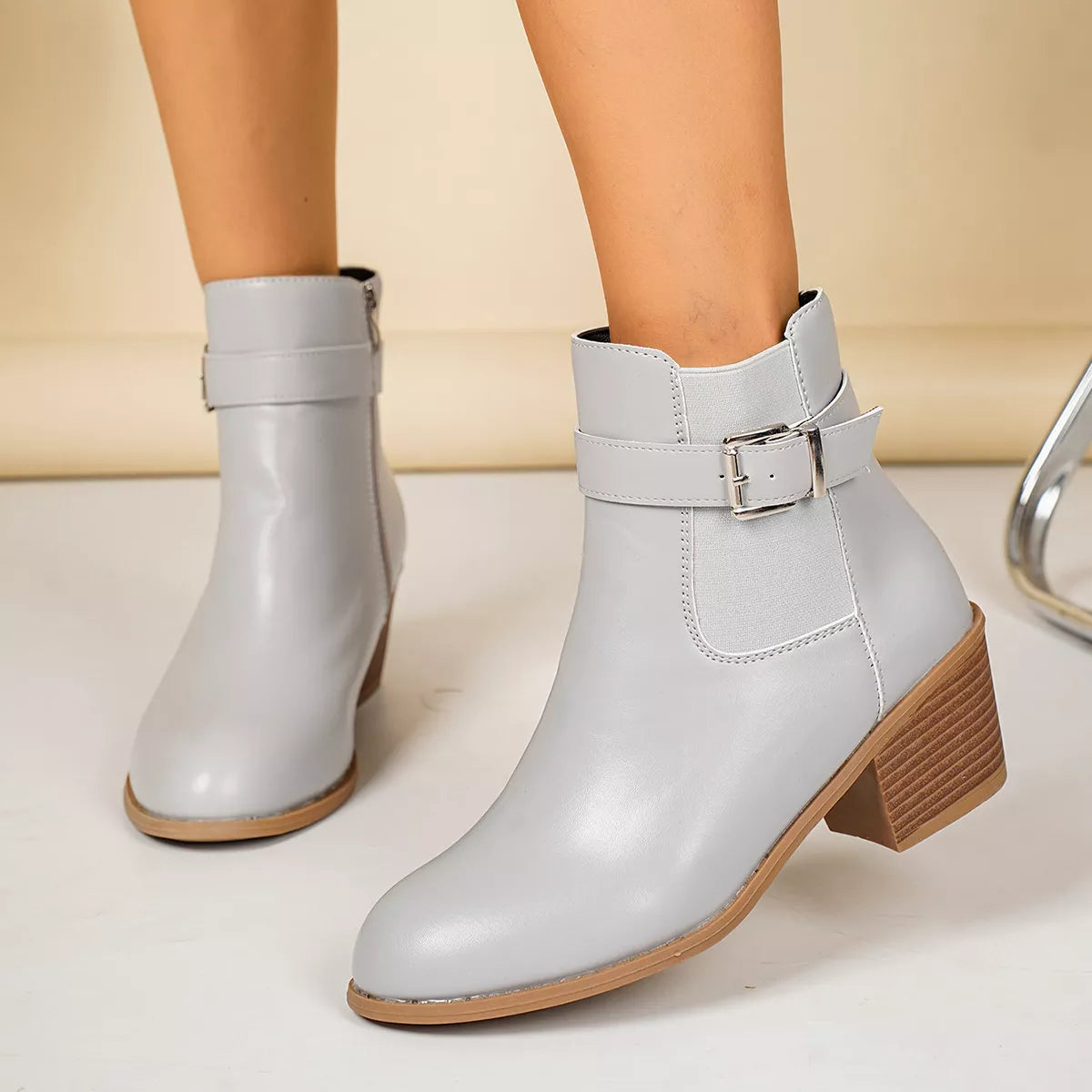Point toe block heel boots, side view
