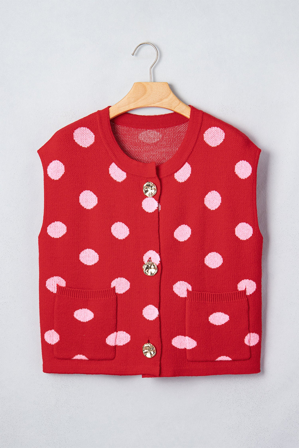 Red knit vest drop shoulder detail