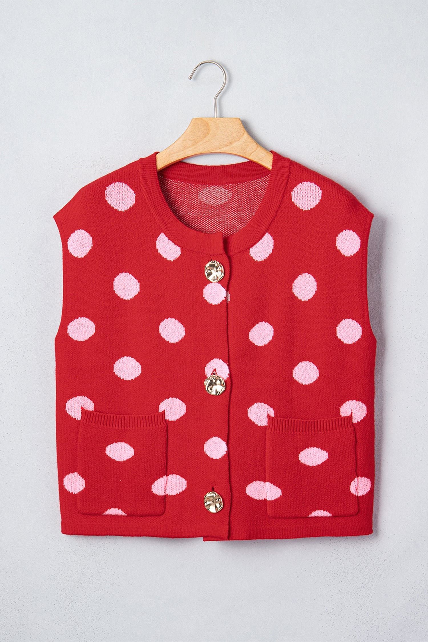 Red knit vest drop shoulder detail
