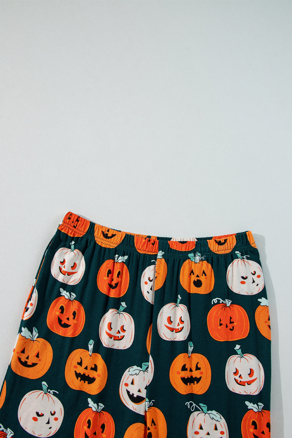 Halloween Pumpkin Shirt and Pants Pajama Set in Orange, close-up print detail