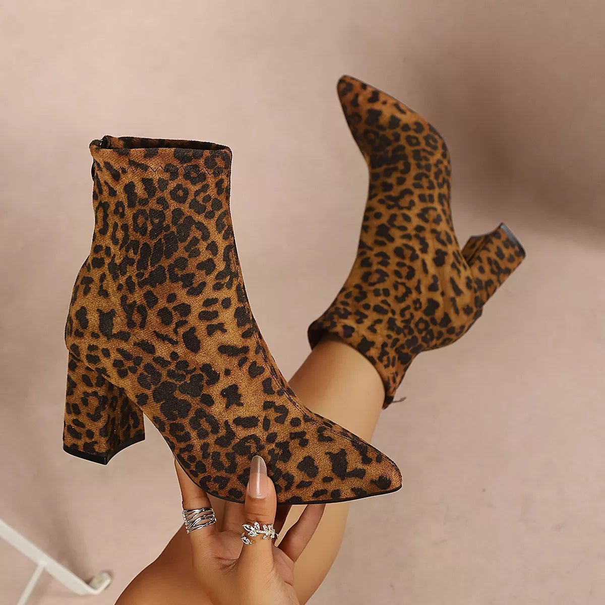 Point toe block heel ankle boots in suede, side view