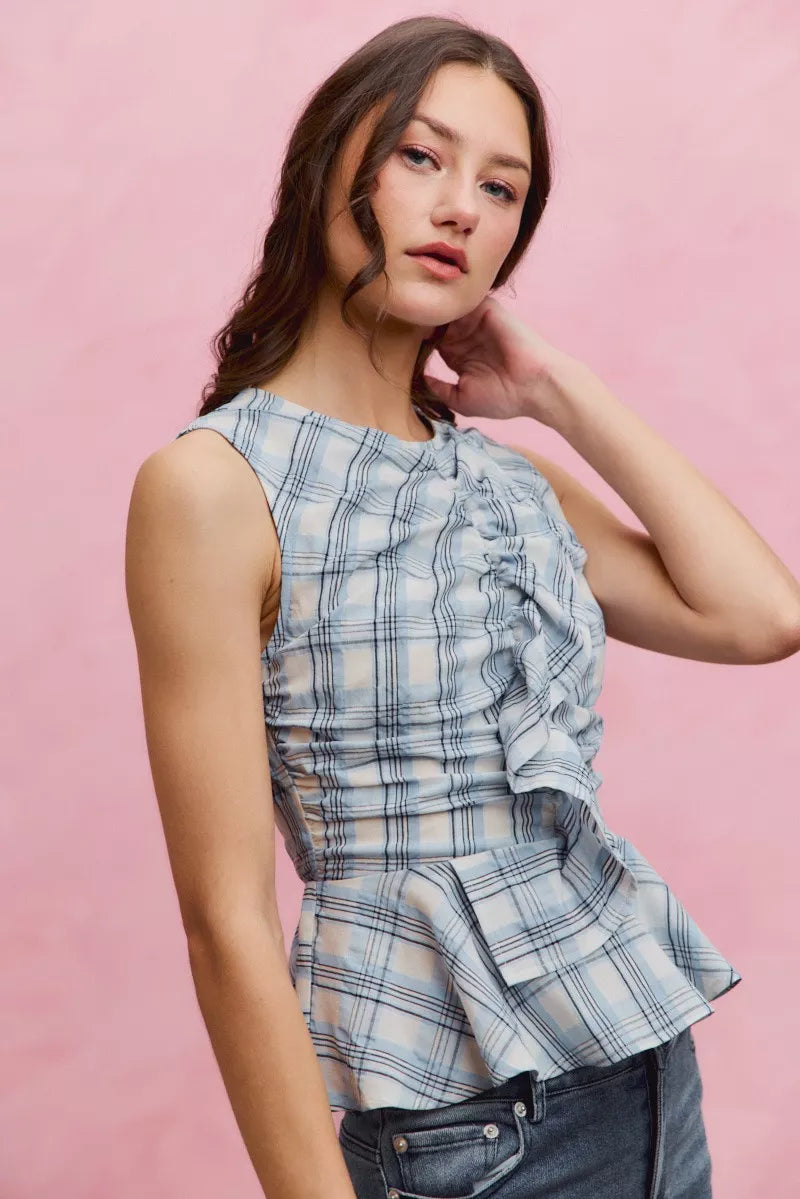 SO ME Plaid Sleeveless Ruffle Peplum Top - side view showing peplum hem