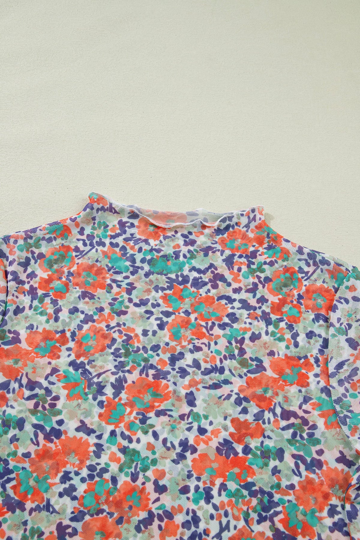 Floral Mesh Mock Neck Top in blue, close-up