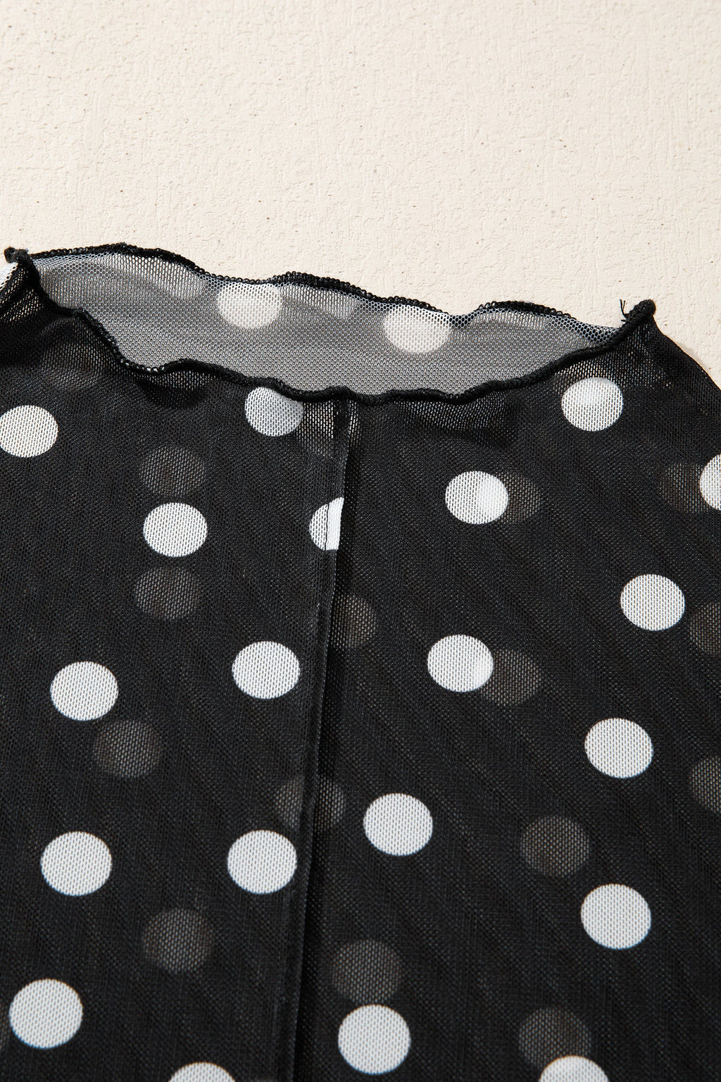 Polka Dot Sheer Mesh High Neck Tee in Black - styled layered over bralette