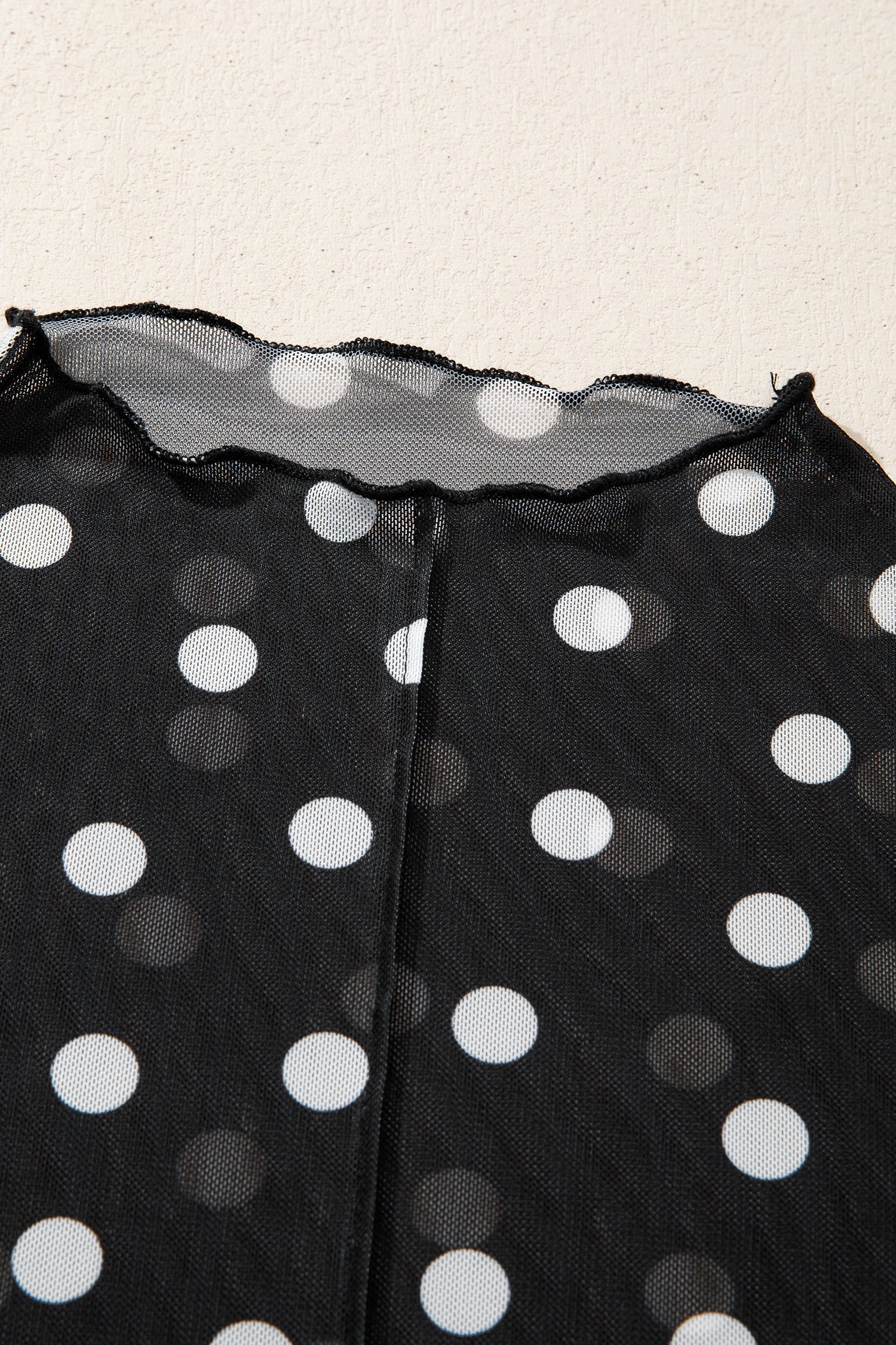 Polka Dot Sheer Mesh High Neck Tee in Black - styled layered over bralette