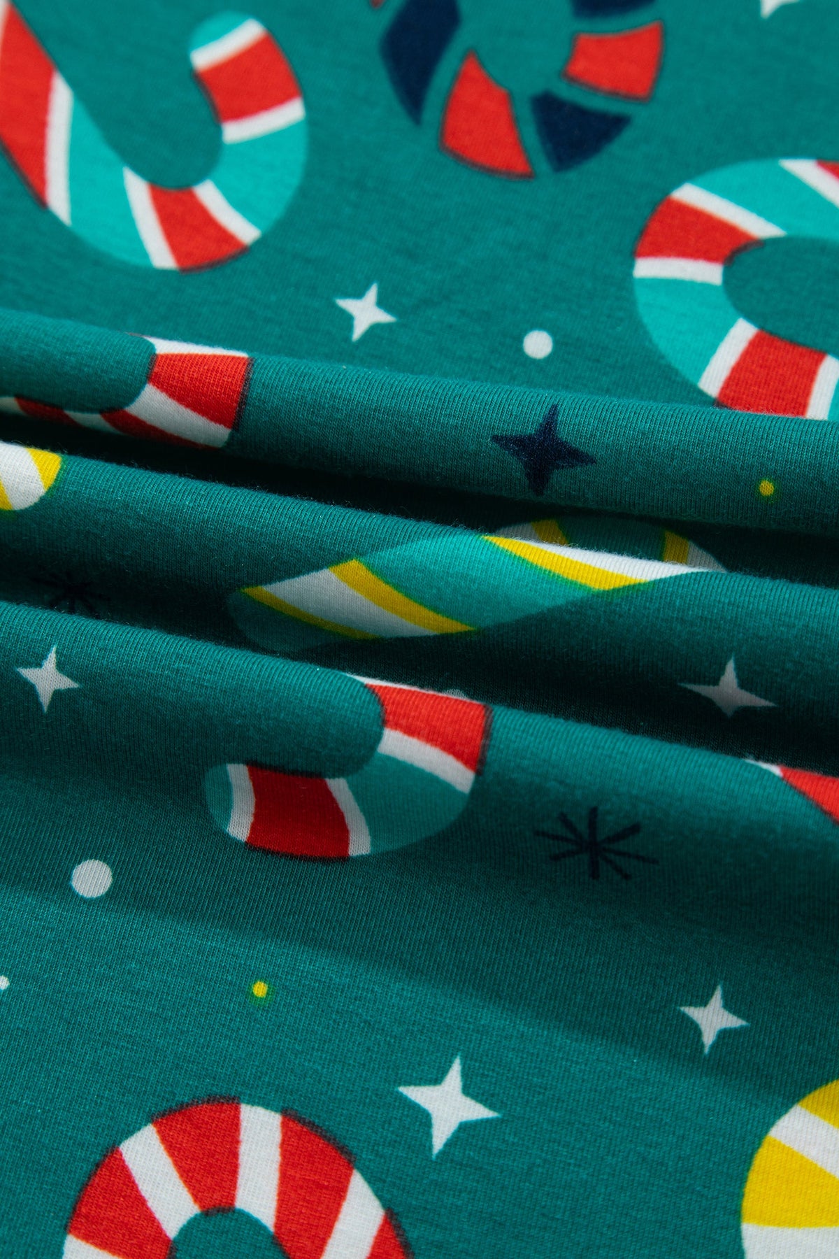 Christmas Candy Cane Pajama Set in green, lifestyle view