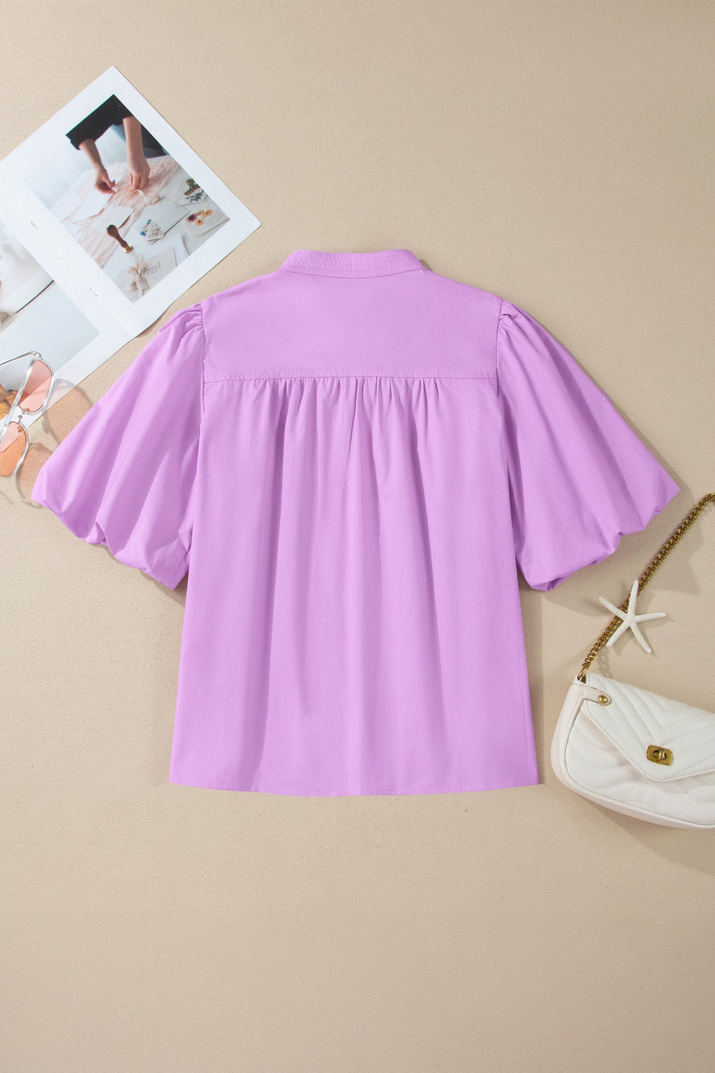 Solid Stitched V-Neck Short Puff Sleeve Blouse - close up of bubble sleeve and stitching detail