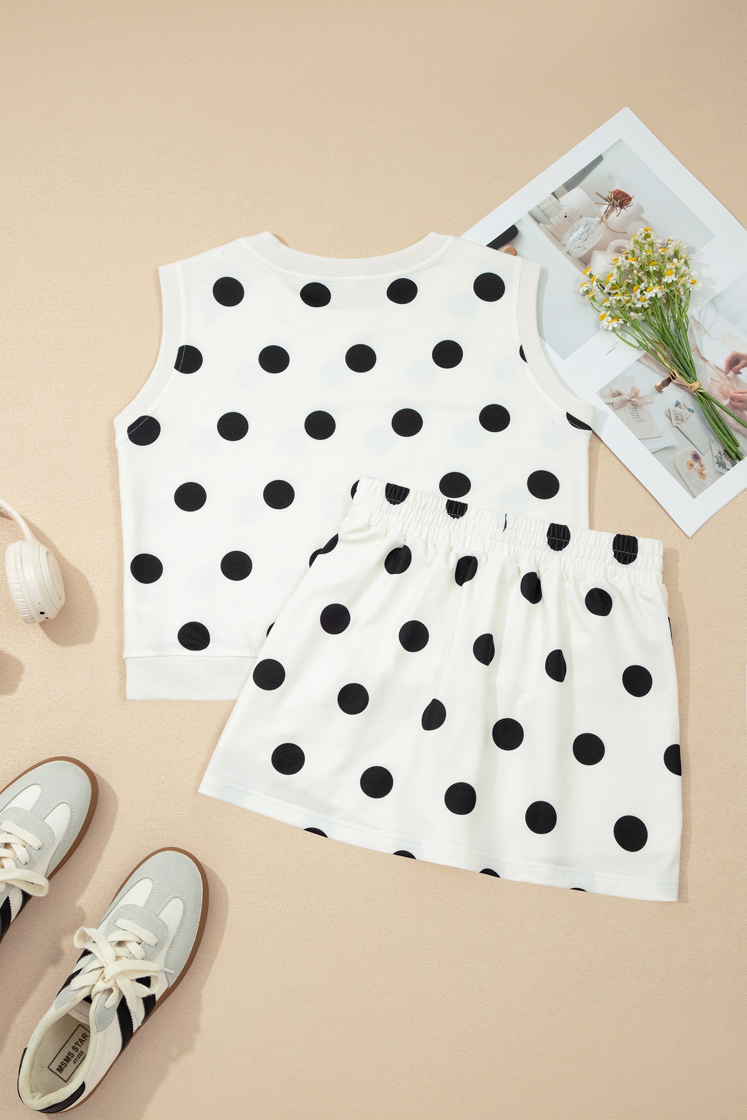Polka Dot Ribbed Trim Tank and Mini Skort Set in White with polka dot print, ribbed trim tank top, and split mini skort shown on model