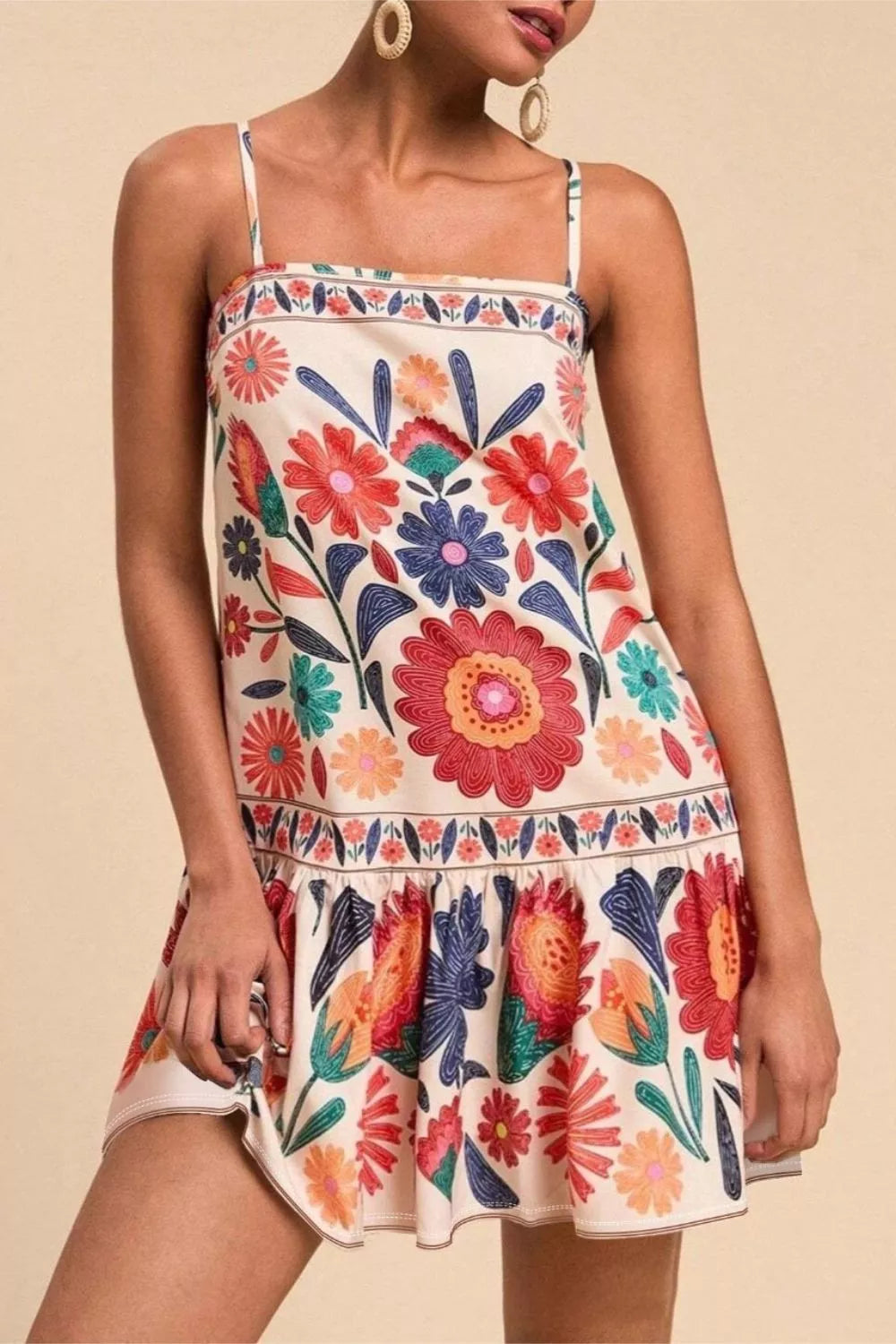 Plus Size Floral Print Sleeveless Mini Dress - front view showing ruffle neckline