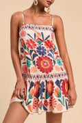 Plus Size Floral Print Sleeveless Mini Dress - front view showing ruffle neckline