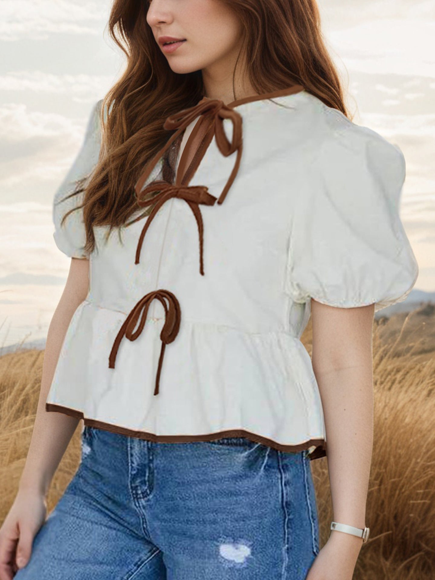 Tie-Front Puff Sleeve Peplum Blouse in Apricot - back view showing peplum hem