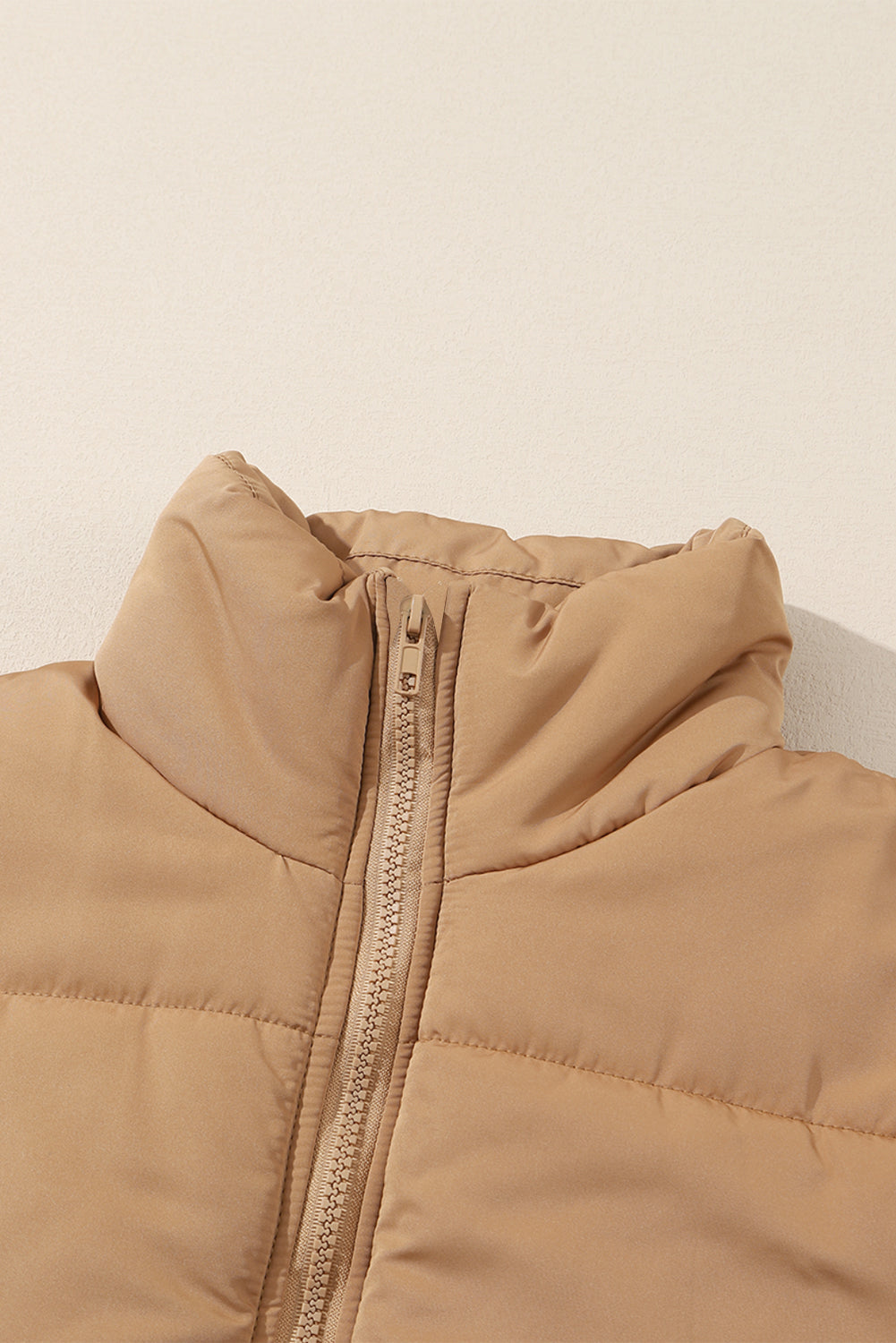 Standing Collar Zip-Up Puffer Vest in khaki, close-up