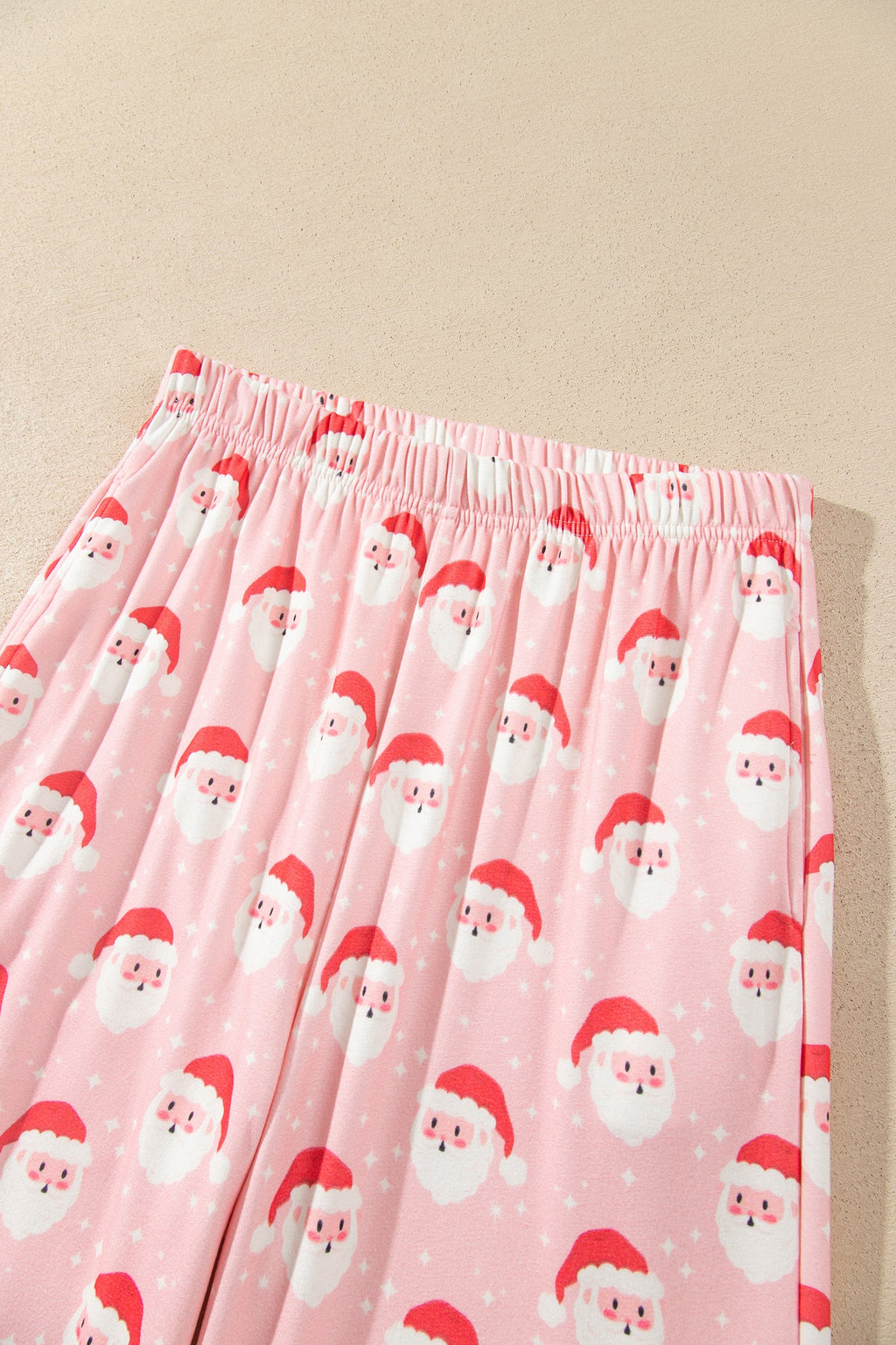 Christmas Santa Ruffle Pajama Set in pink, close-up print detail
