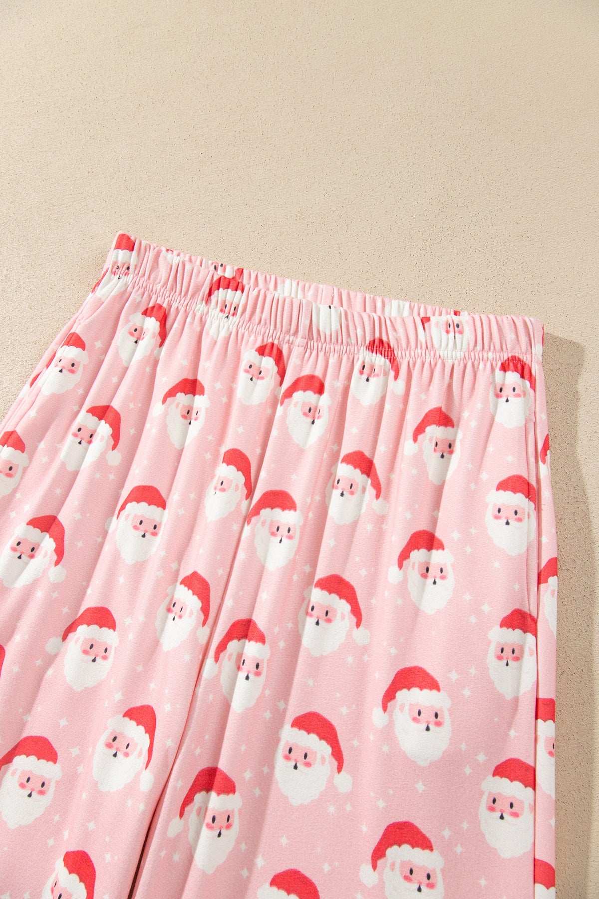 Christmas Santa Ruffle Pajama Set in pink, close-up print detail