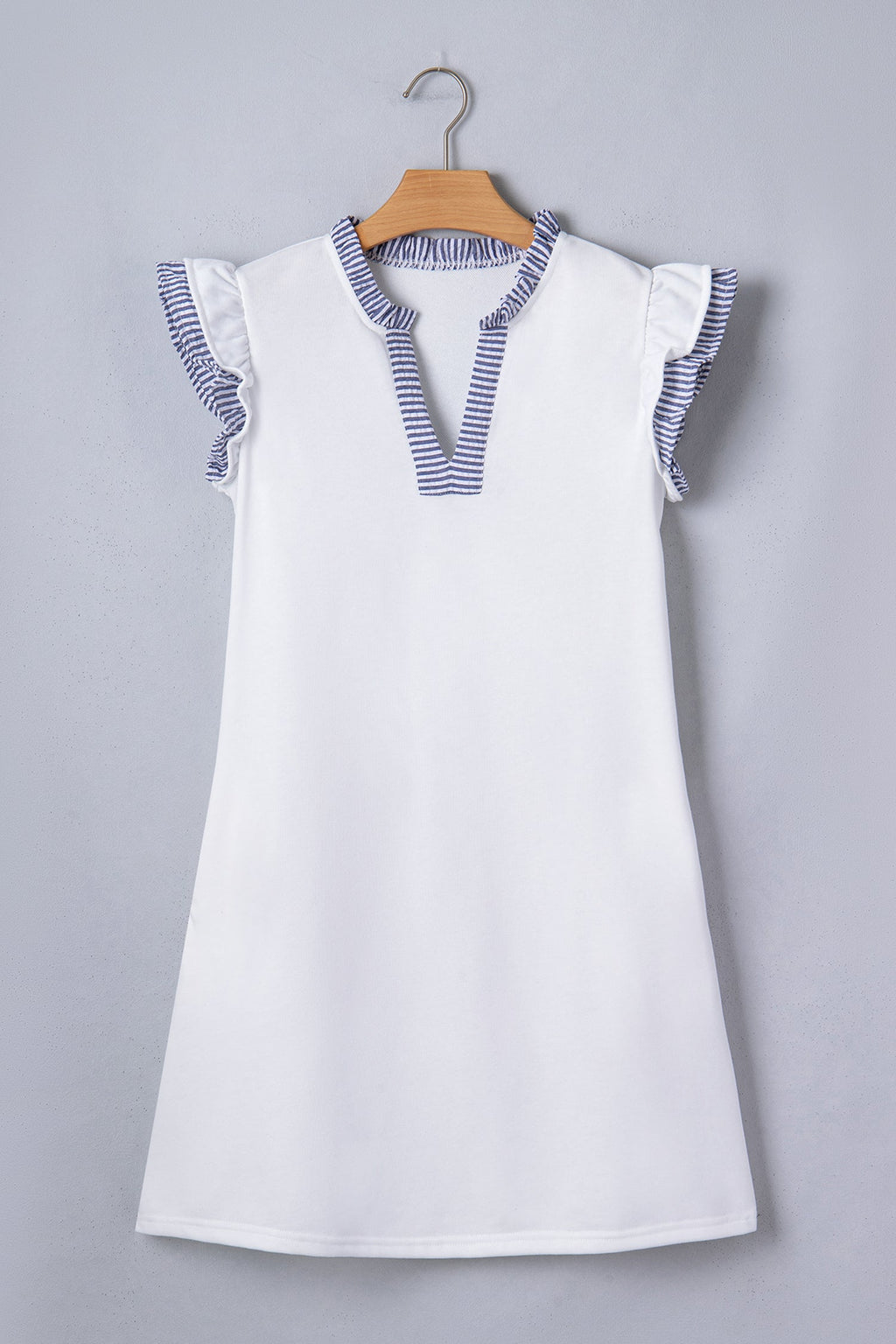 Stripe Patchwork Split Neck Ruffle Trim Sleeveless Dress in White with stripe patchwork, split neckline, double ruffle trim, and sleeveless silhouette shown on model