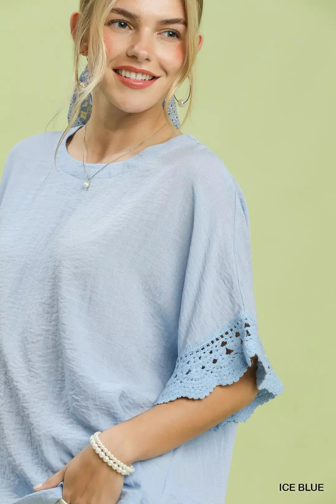 Umgee Crochet Trim Flutter Sleeve Top in Ice Blue - side view