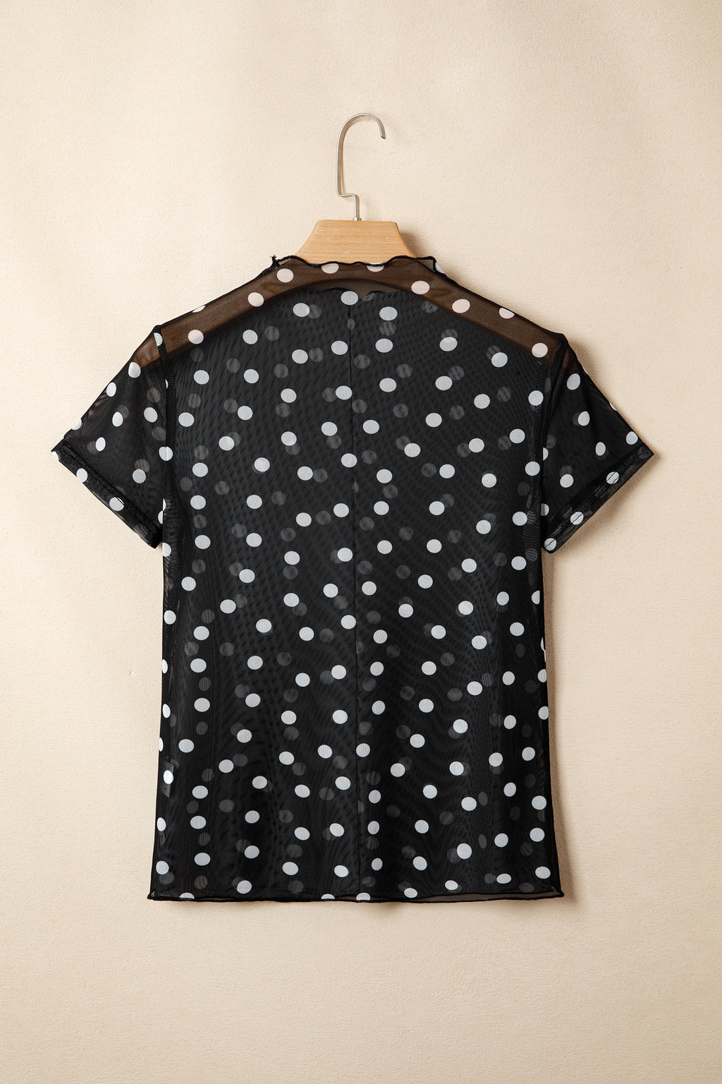 Polka Dot Sheer Mesh High Neck Tee in Black - close up of polka dot mesh fabric