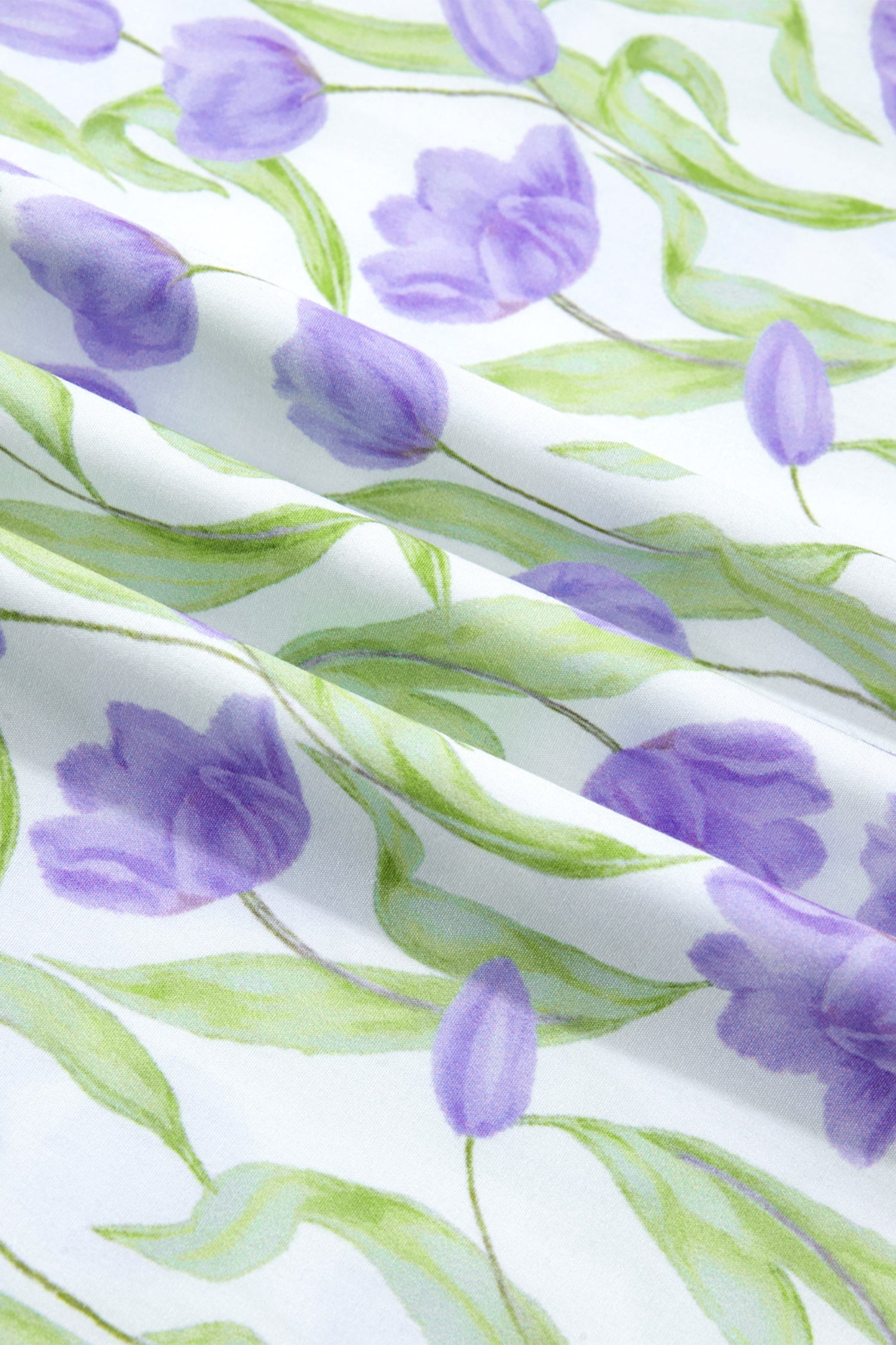 Floral Tulip Contrast Trim Midi Dress in Purple with floral print, colorblock contrast trim, flutter sleeves, and relaxed shift silhouette shown on model