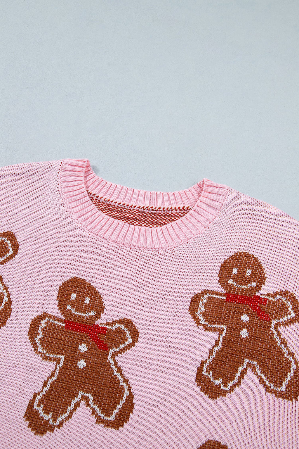 Christmas Gingerbread Round Neck Sweater in pink, close-up