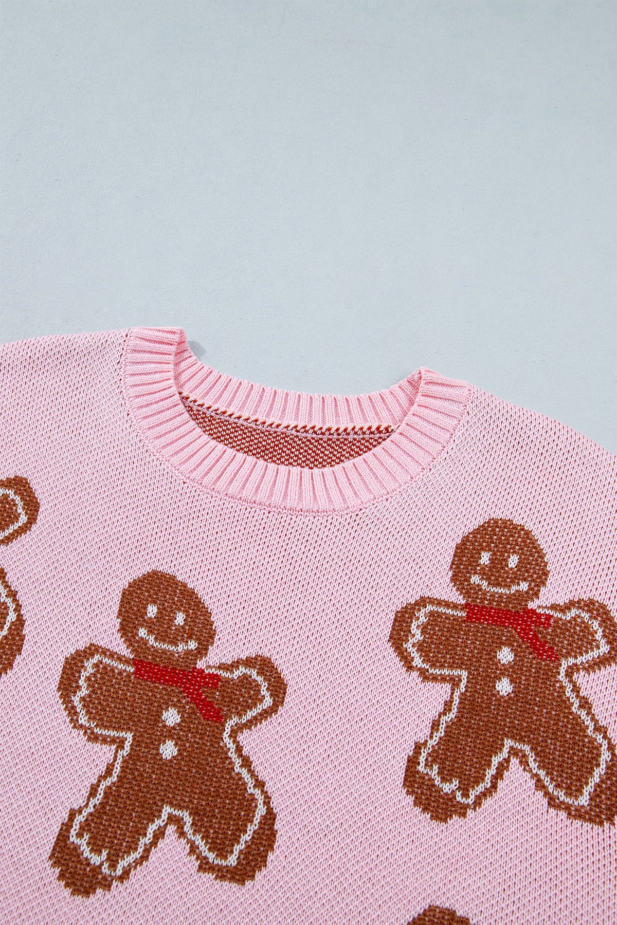 Christmas Gingerbread Round Neck Sweater in pink, close-up