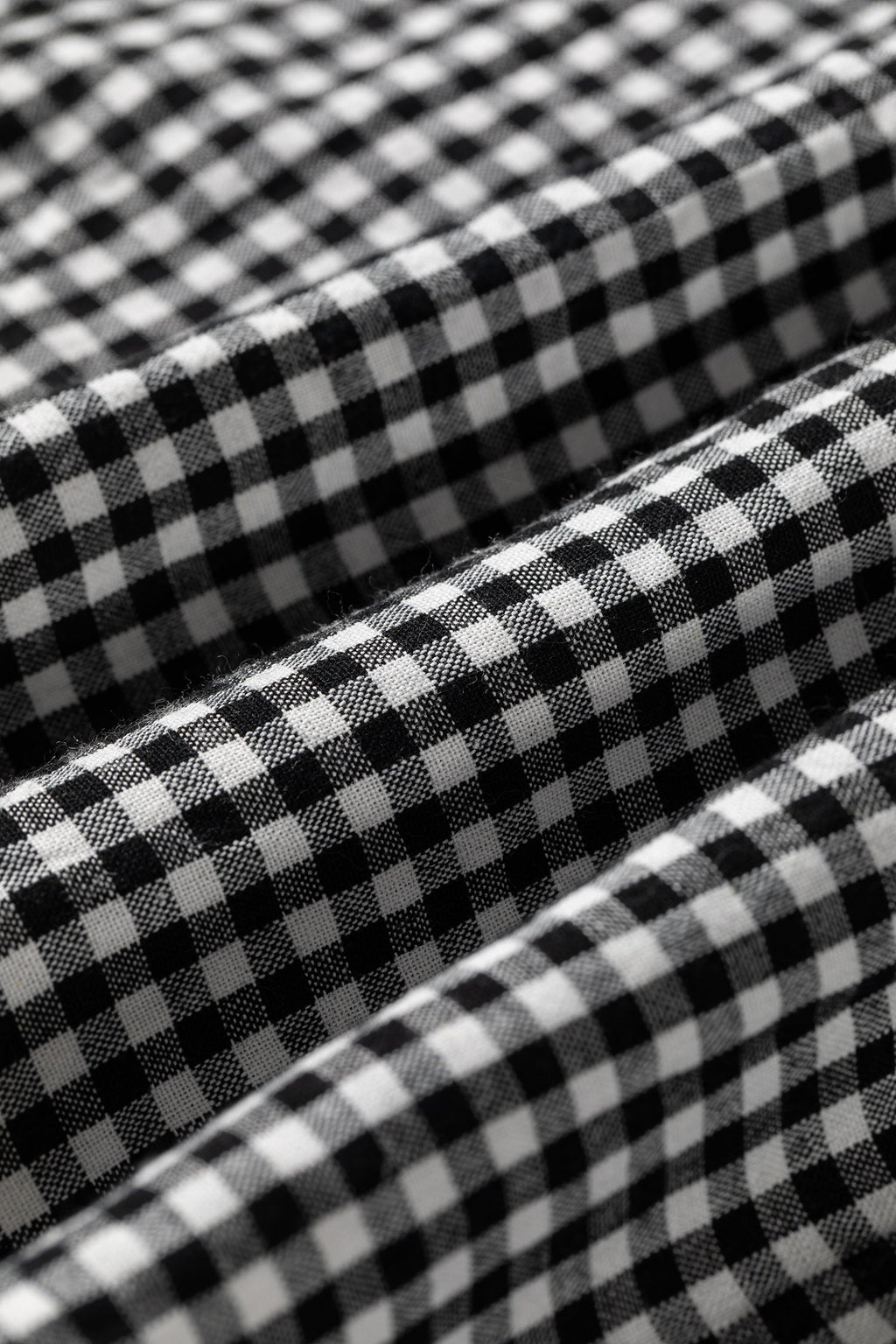 Black gingham blouse fabric detail
