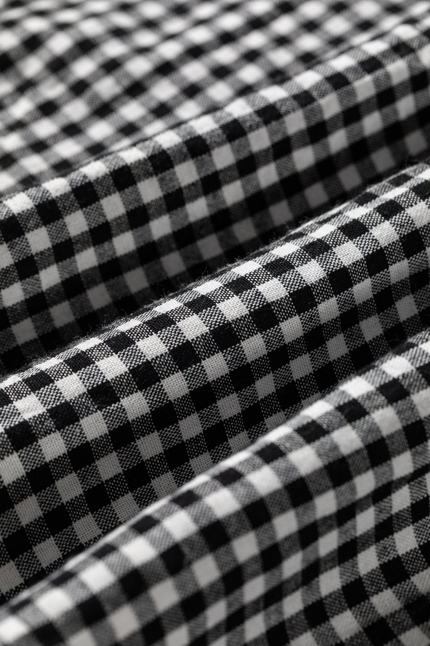 Black gingham blouse fabric detail