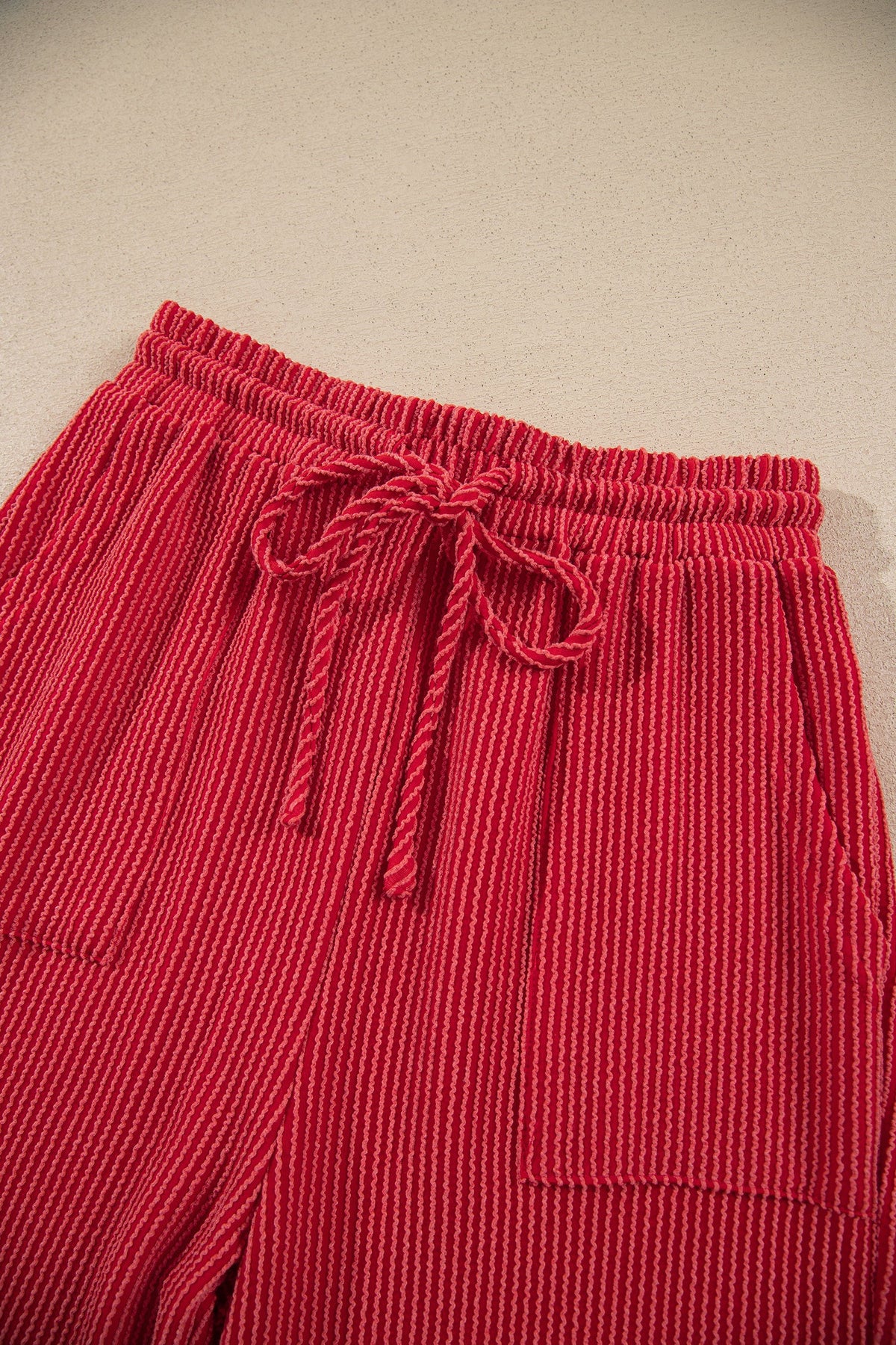 Christmas Corded Knit Top & Pants Set in red, black and green, close-up print detail