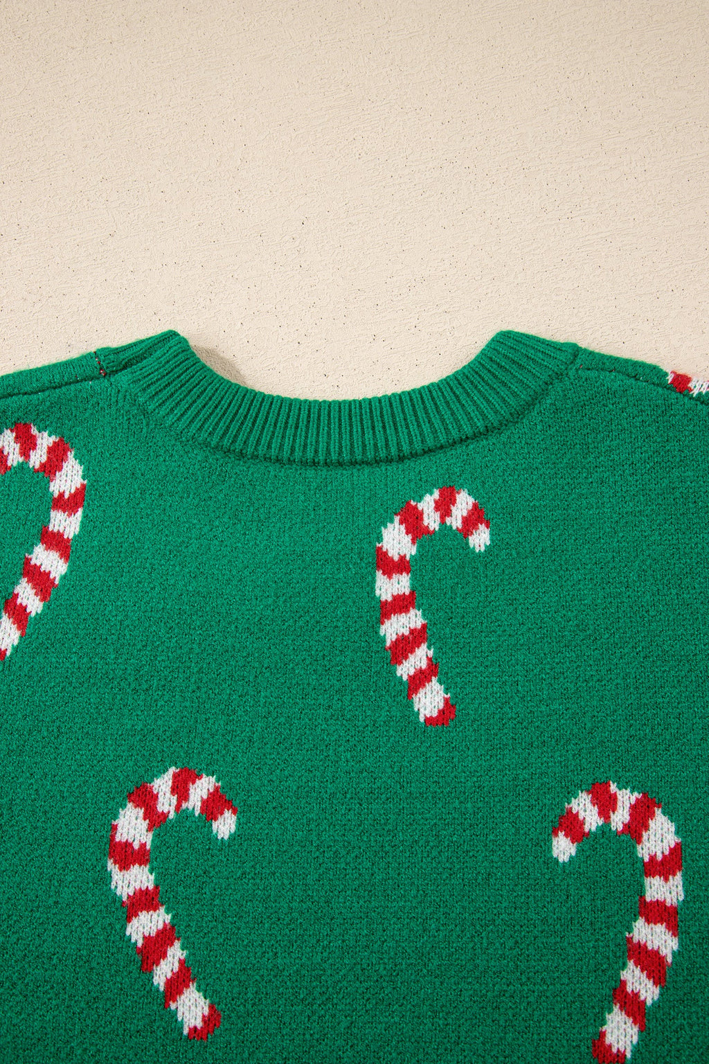 Christmas Candy Cane Drop Shoulder Sweater in dark green and sachet pink, back view