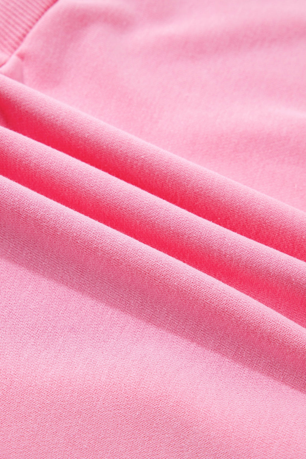 Halloween Embroidered Jack-O-Lantern Sweatshirt in Pink, close-up detail