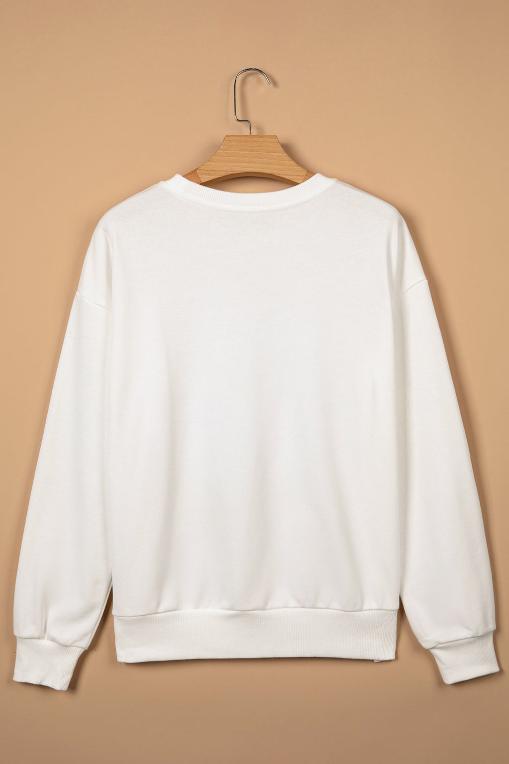 Christmas Holly Jolly Patchwork Sweatshirt in white, worn