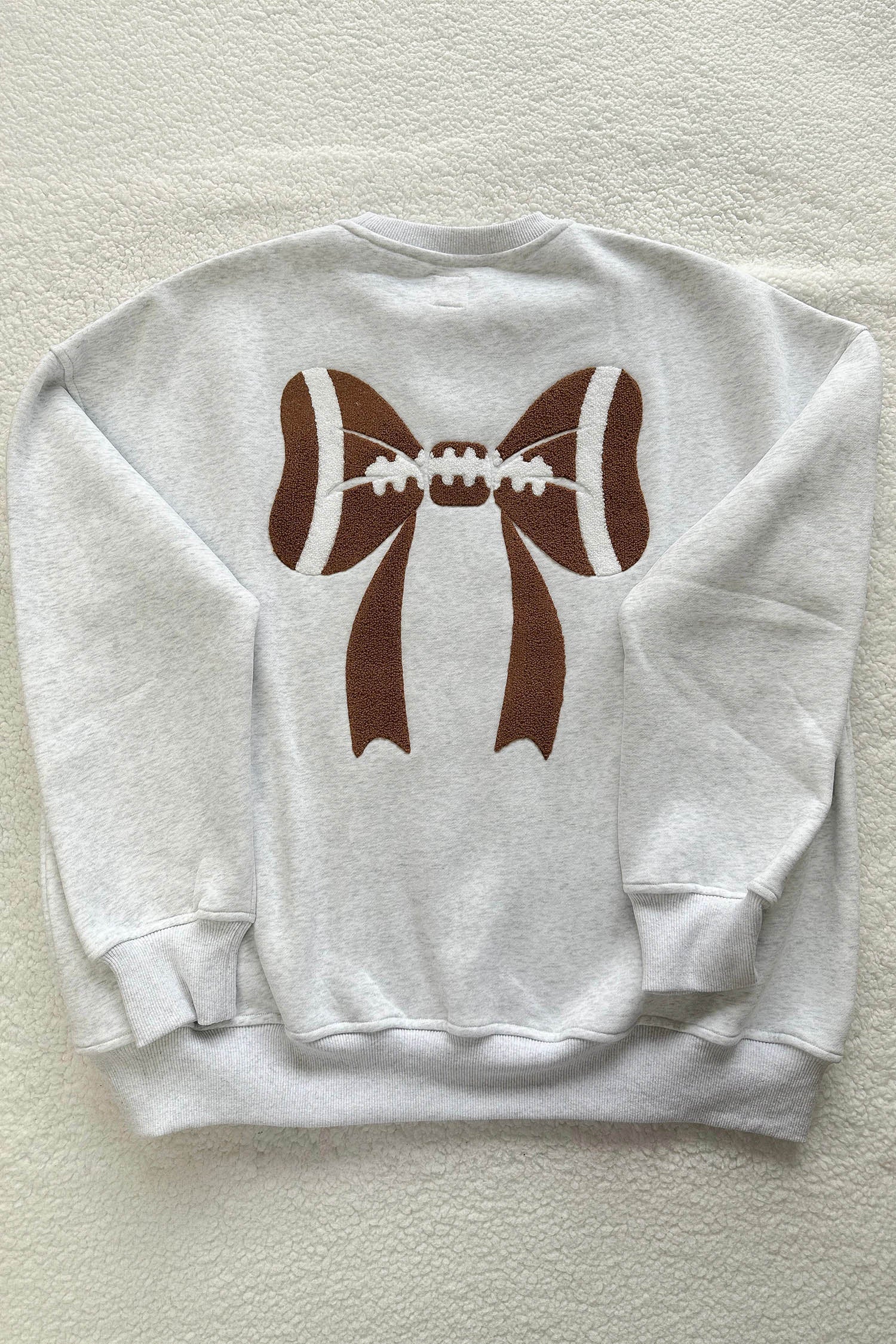 Gray rugby-style oversized sweatshirt styled look
