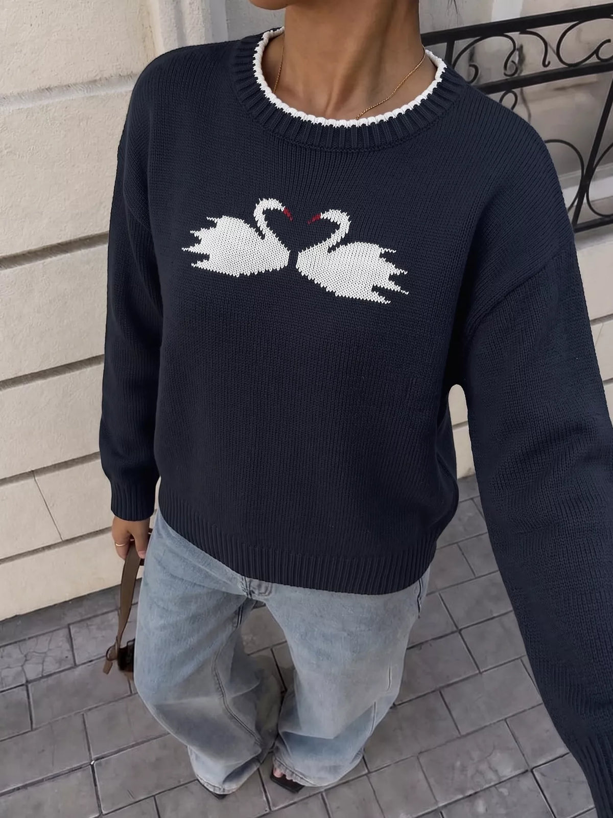 Swan drop shoulder sweater in navy, side view
