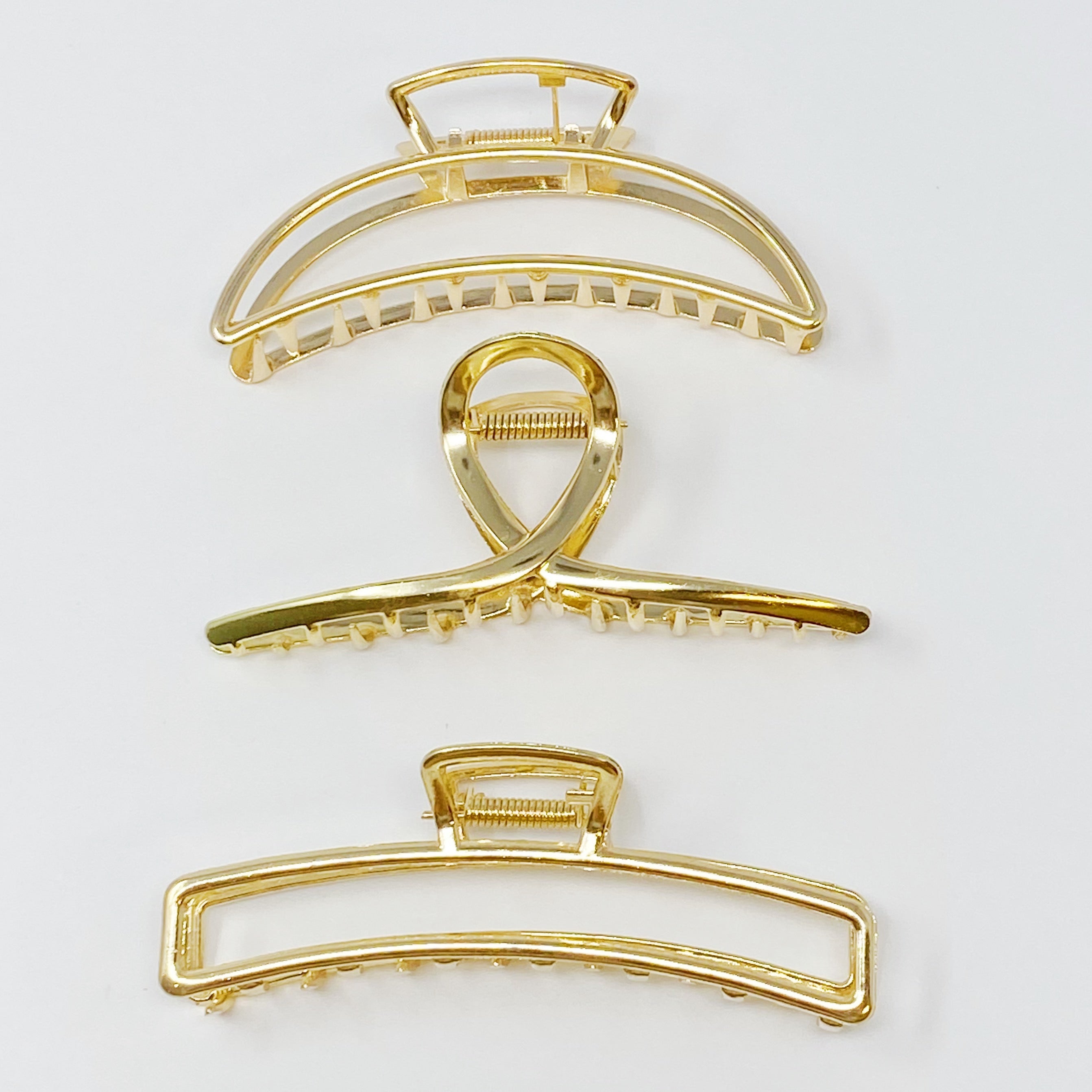 Gold Mine Hair Claw Set Of 3 - three gold finish hair claws with distinct designs