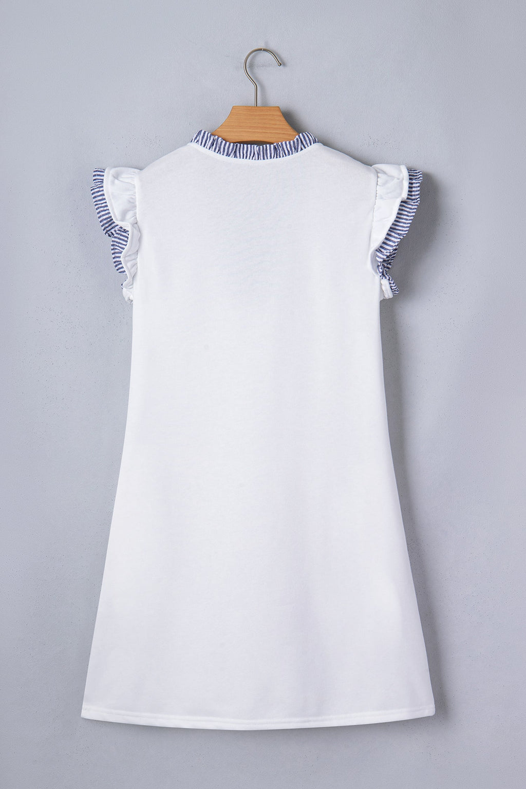 Stripe Patchwork Split Neck Ruffle Trim Sleeveless Dress in White with stripe patchwork, split neckline, double ruffle trim, and sleeveless silhouette shown on model