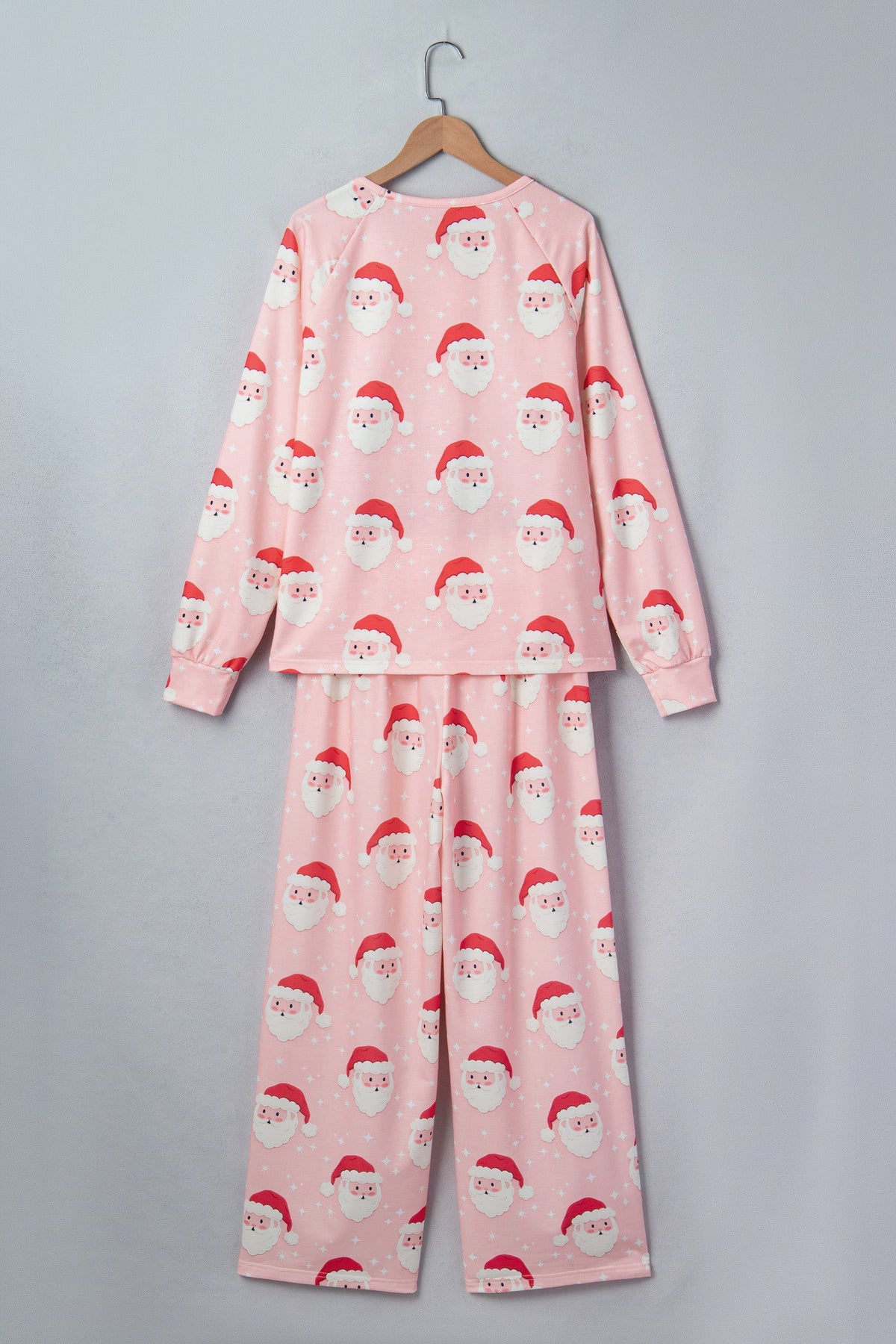 Christmas Santa Raglan Pajama Set in pink, styled view