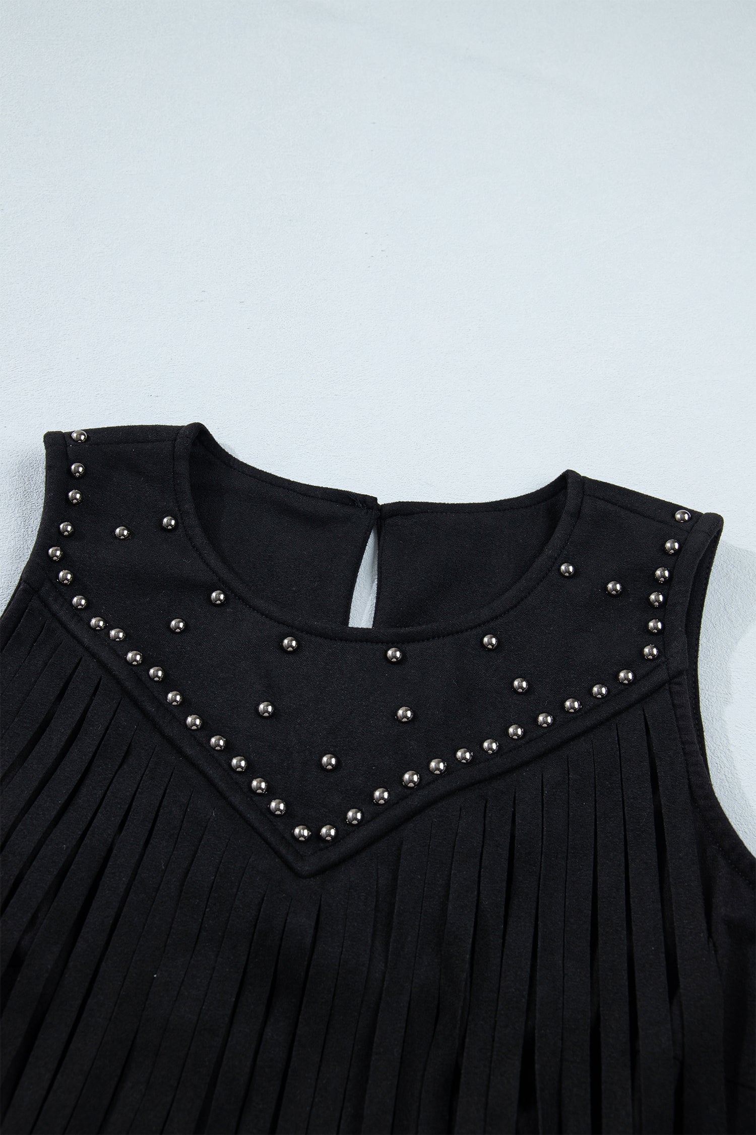 Western Fringe Rivet Panel Sleeveless Top - side view showing fringe movement