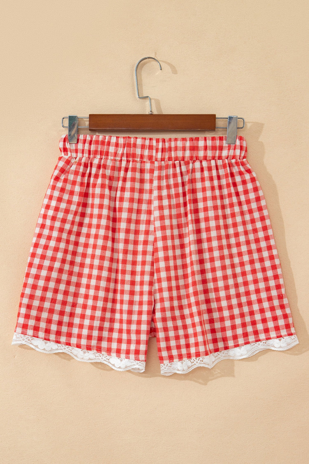 Gingham Plaid Tie Waist Lace Hem Shorts in Red with gingham print, front tie waist, and lace hem trim shown on model
