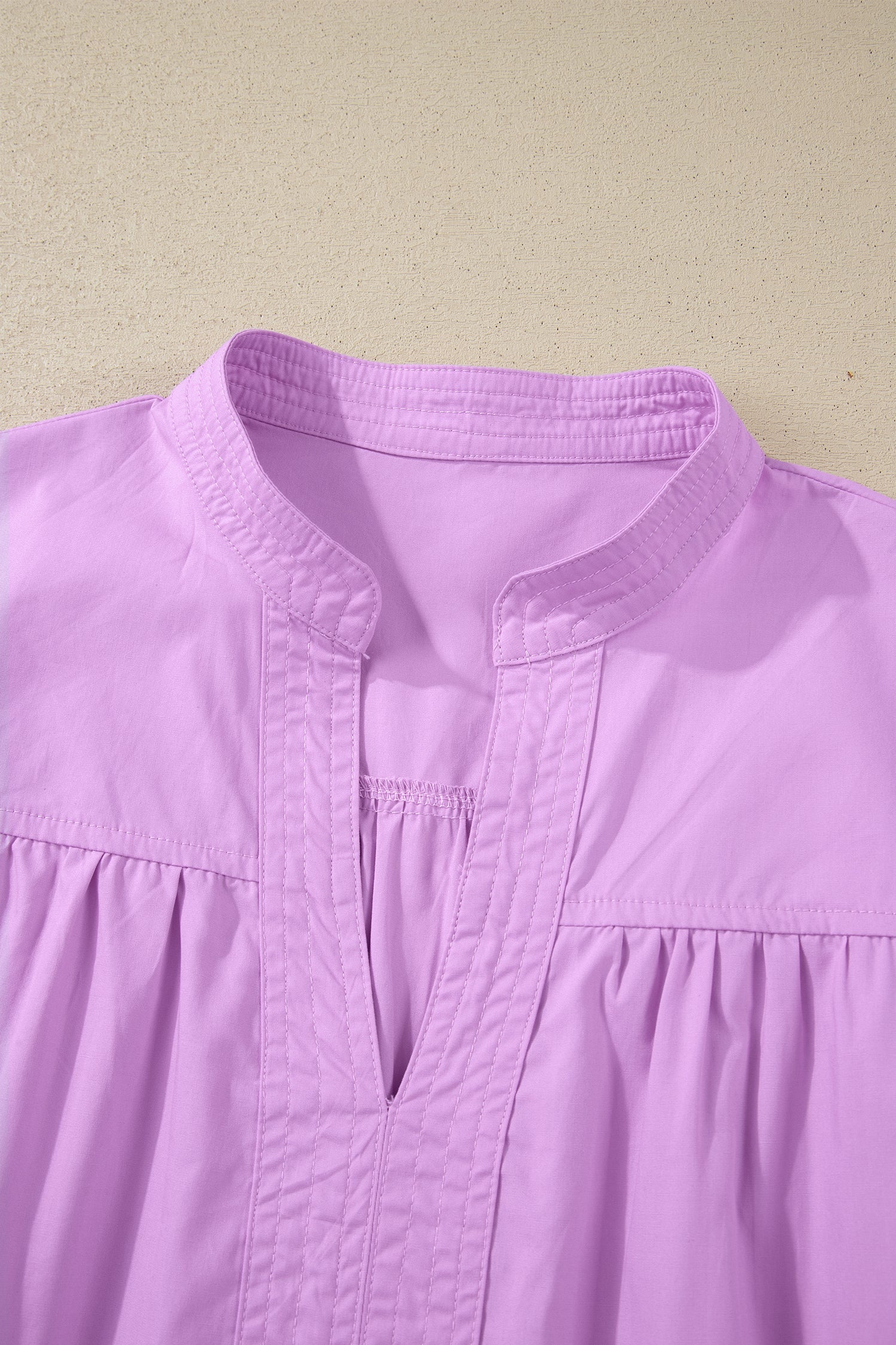 Solid Stitched V-Neck Short Puff Sleeve Blouse - side view