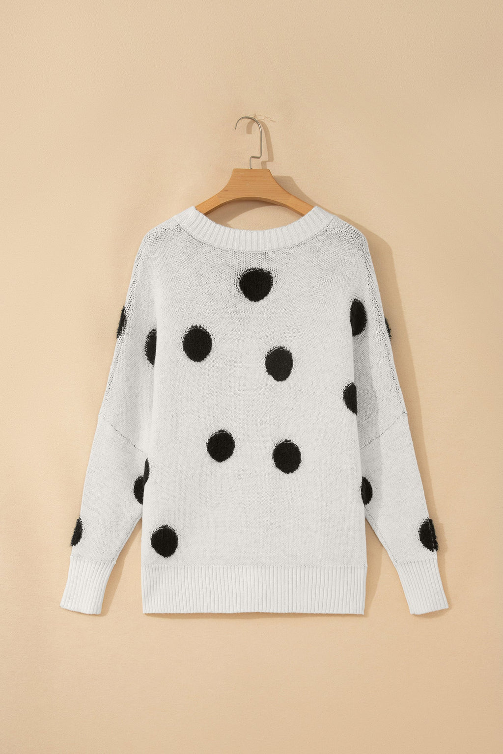 Polka dot cardigan front pocket detail