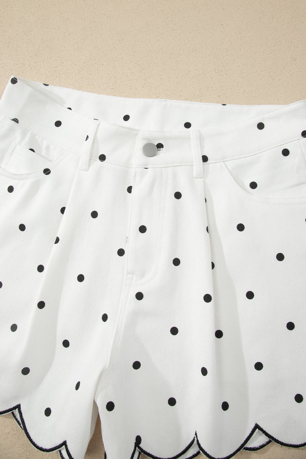 White polka dot embroidered denim shorts styled look