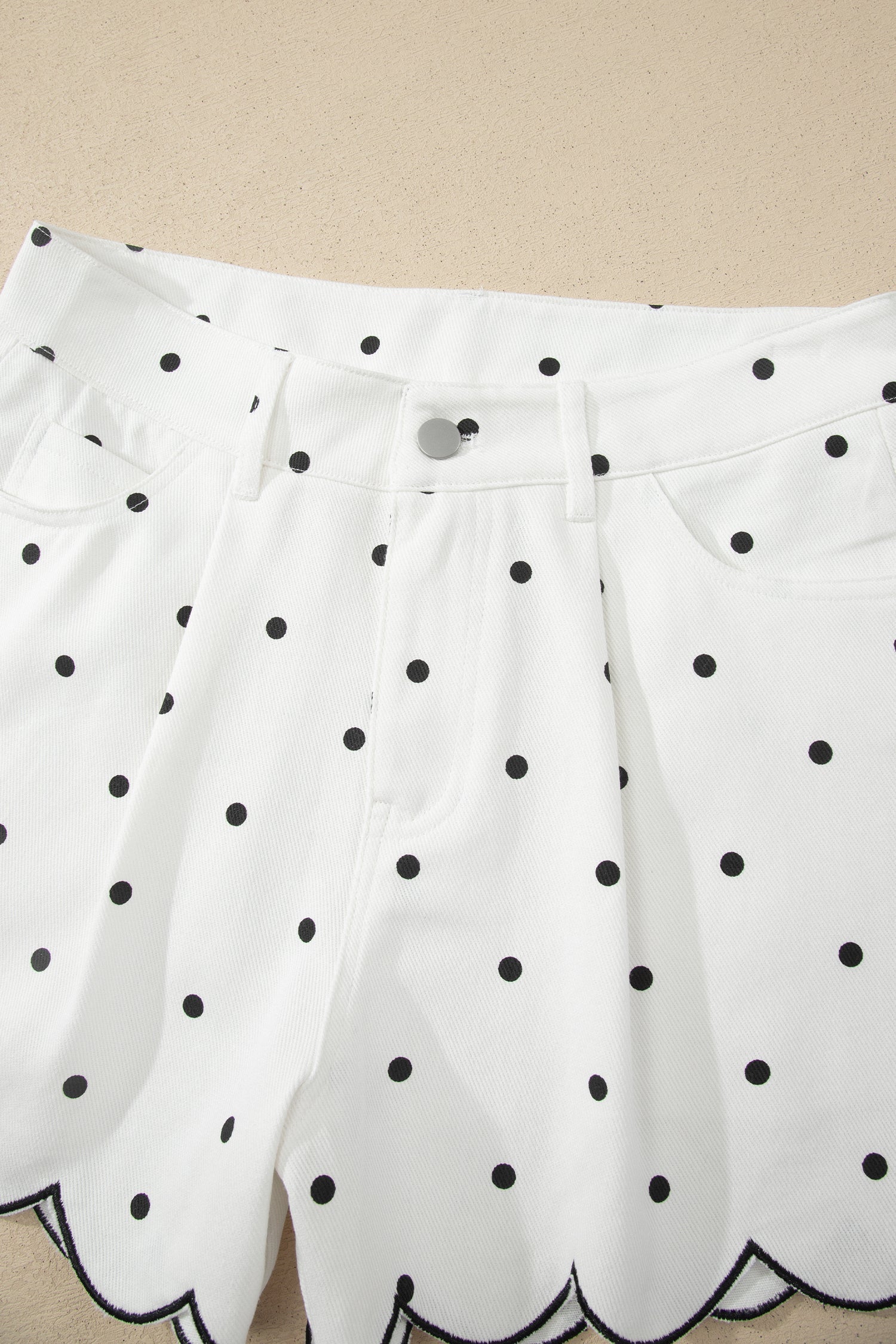 White polka dot embroidered denim shorts styled look