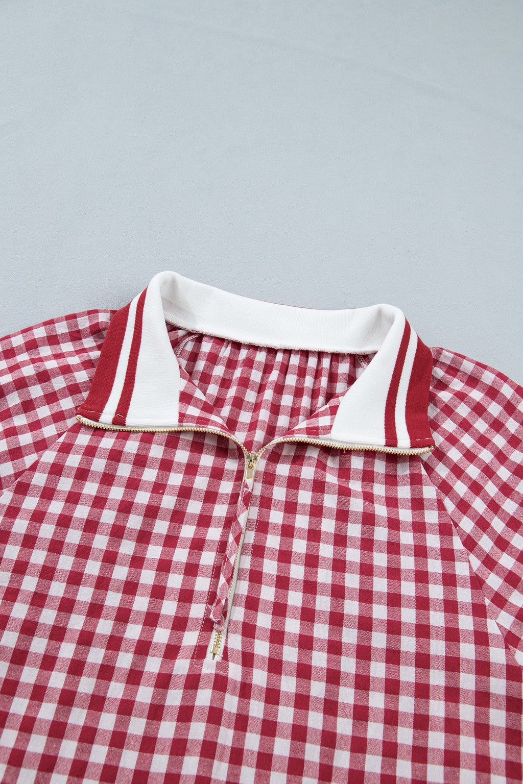 Gingham blouse striped trim collar detail