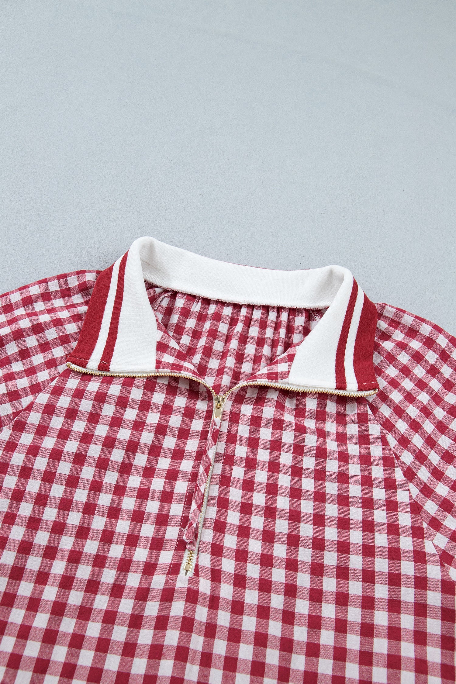 Gingham blouse striped trim collar detail