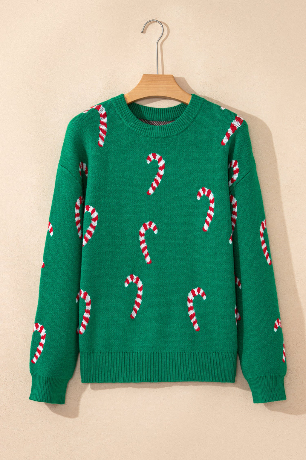 Christmas Candy Cane Drop Shoulder Sweater in dark green and sachet pink, detail view